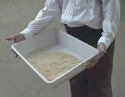 Sawdust in bottom pan